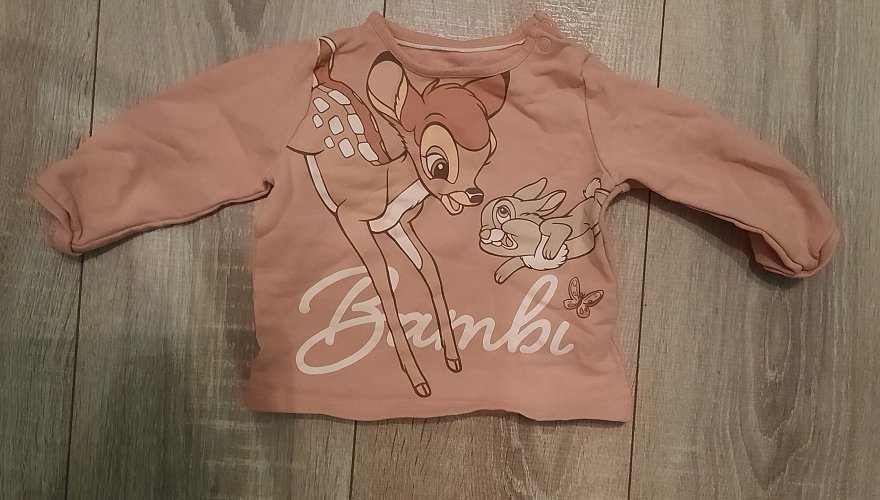 Rosafarbener Pullover